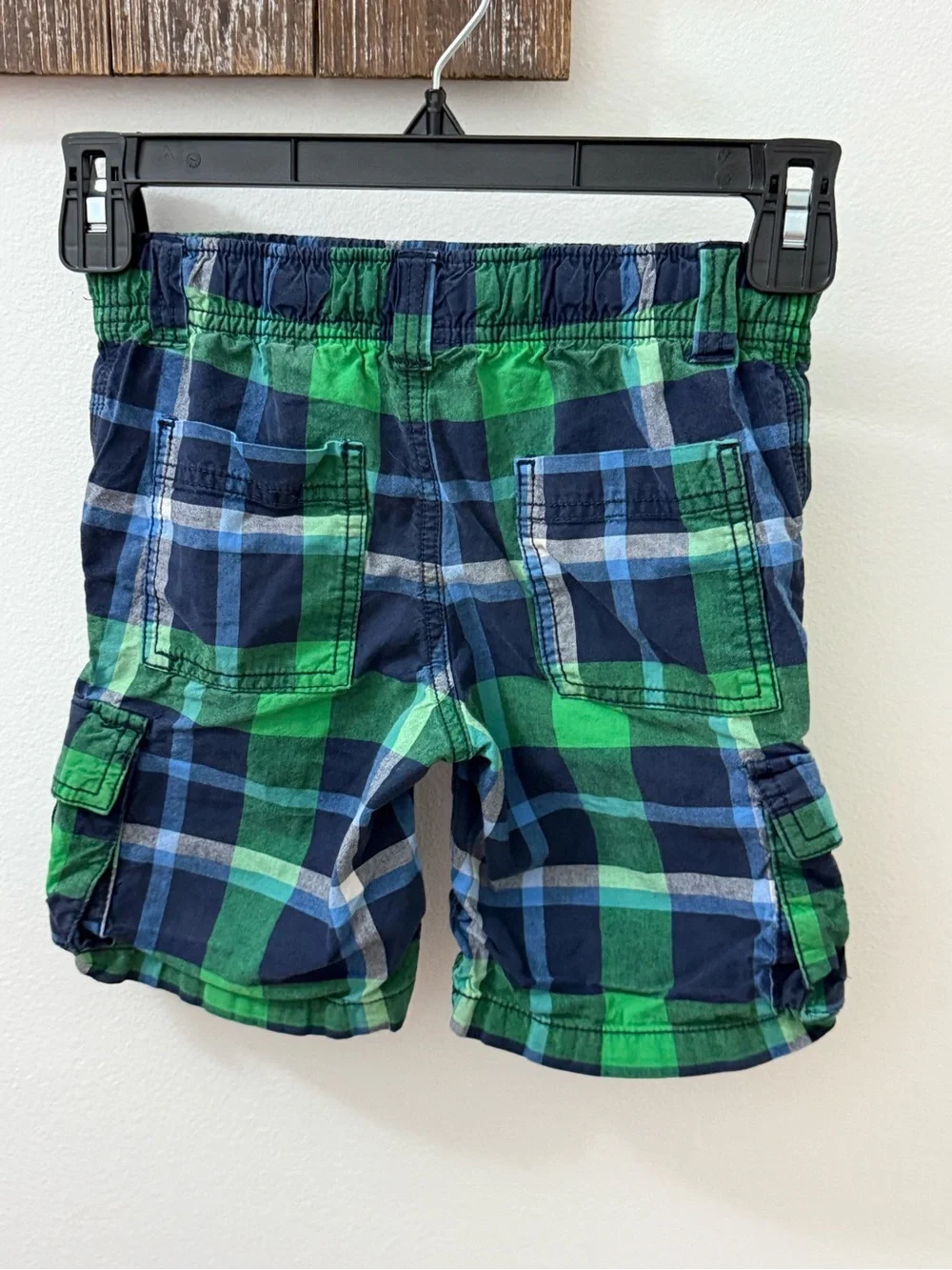 Gymboree boys green and navy blue plaid cargo shorts with an elastic waistband.